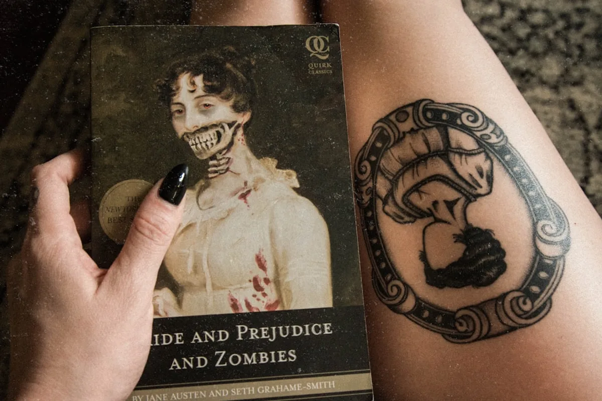 person holding a black and white book