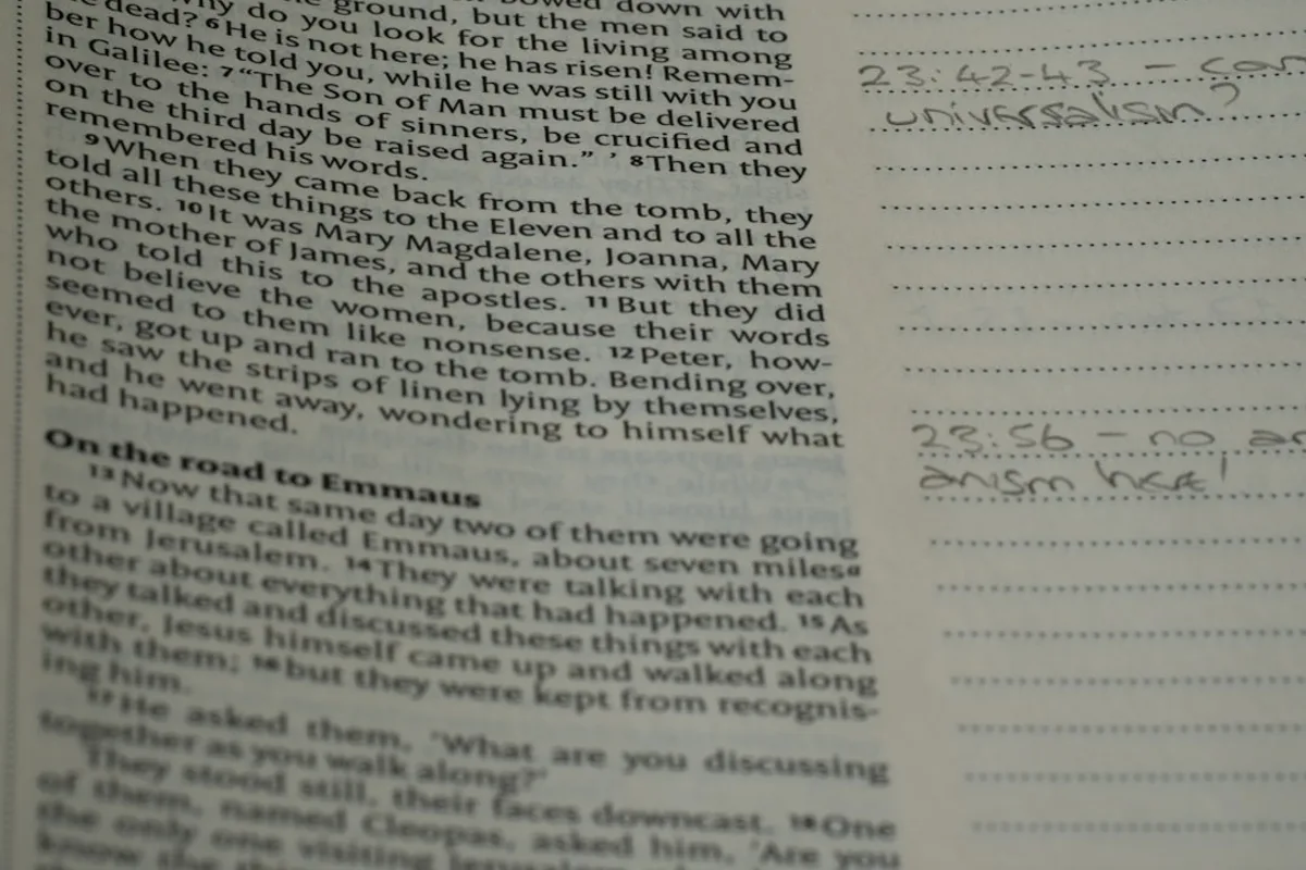 A close up of a book with writing on it