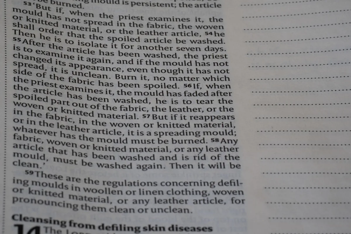 Book page with text about defiling moulds and blank lines.