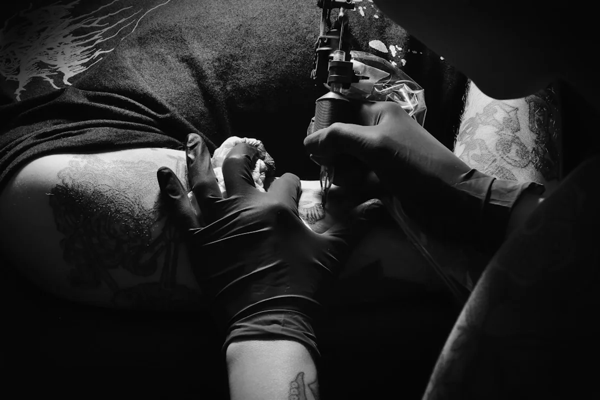 a person holding a bottle